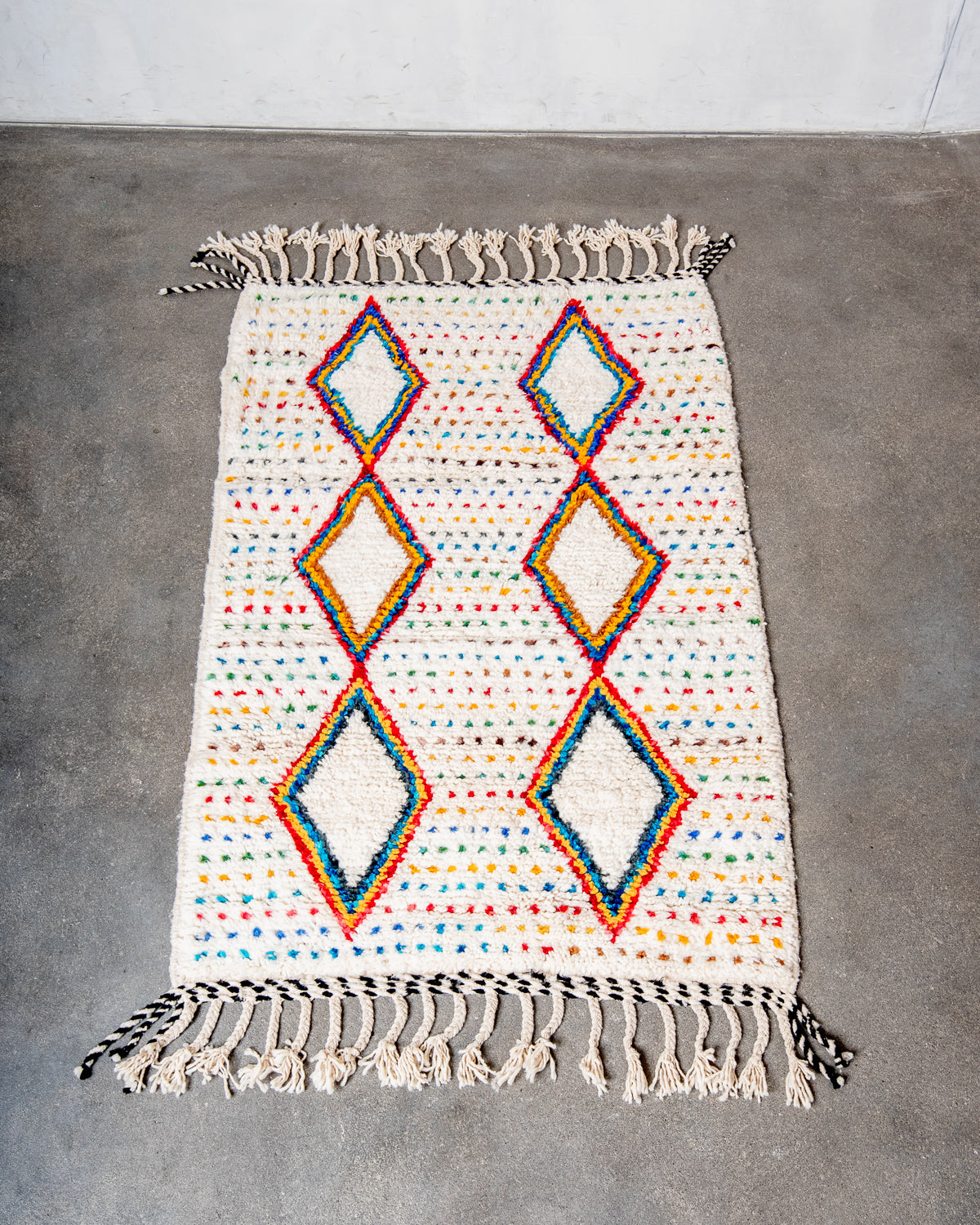 Modern, designer, handcrafted Berber rug from Morocco. Beniourain carpet with beautiful colours and patterns and fluffy wool texture.
